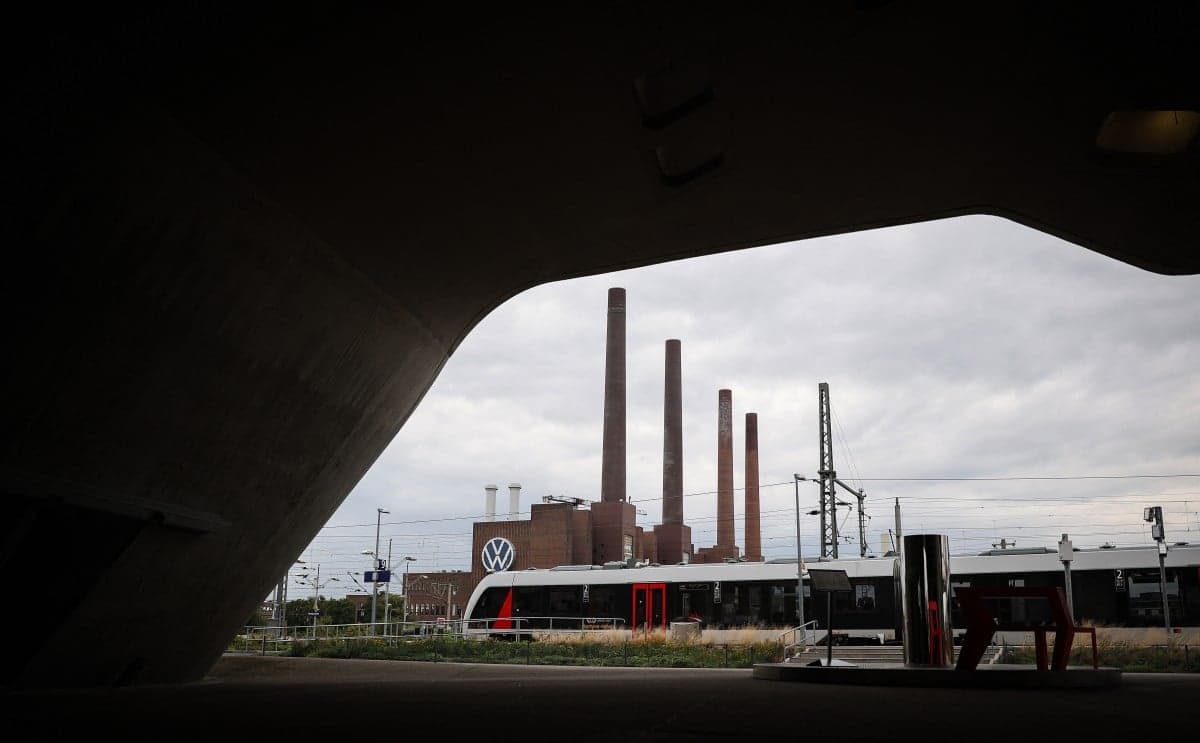 Crisis-hit German auto giant Volkswagen cuts forecasts